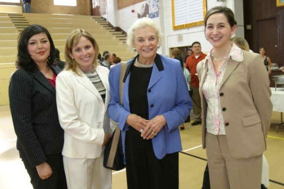 image of four women standing together